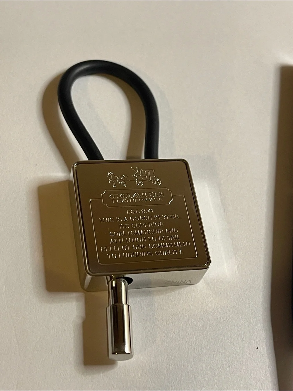 Coach Silver Padlock Keyring with Black Coach Pen